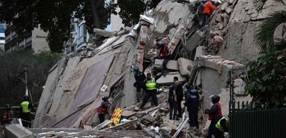 WEBSITE - 2026-06-25T093805.836 2 Gedung Runtuh, 18 Warga Berhasil Dievakuasi dari Reruntuhan Akibat Gempa Venezuela